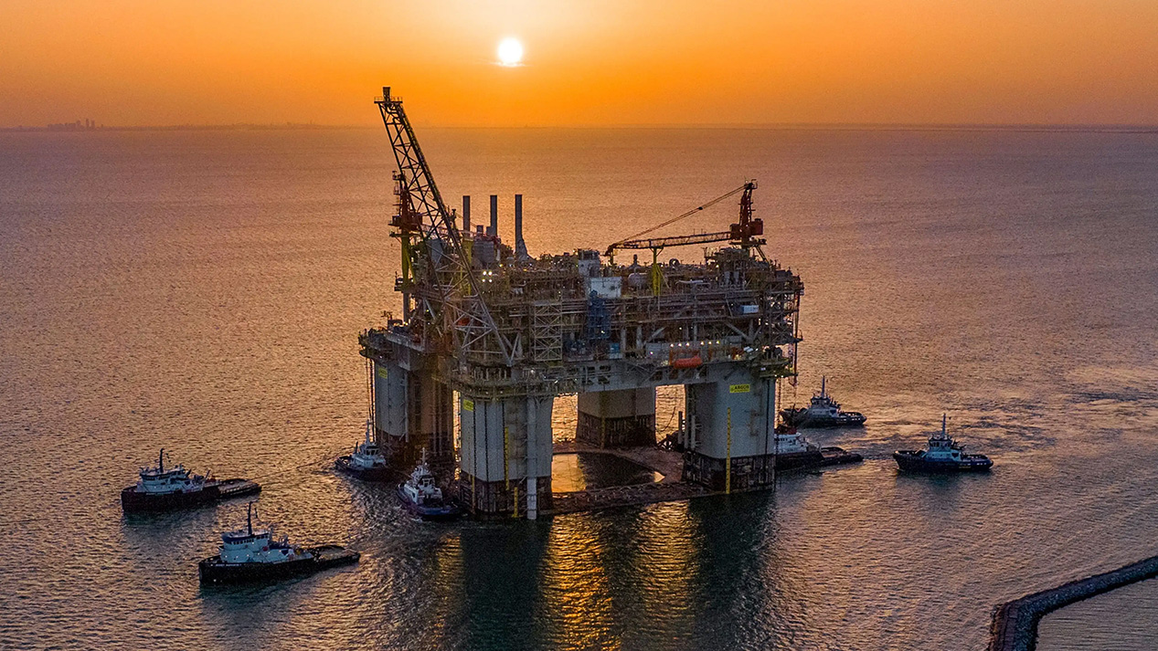 bp offshore platform at sunset